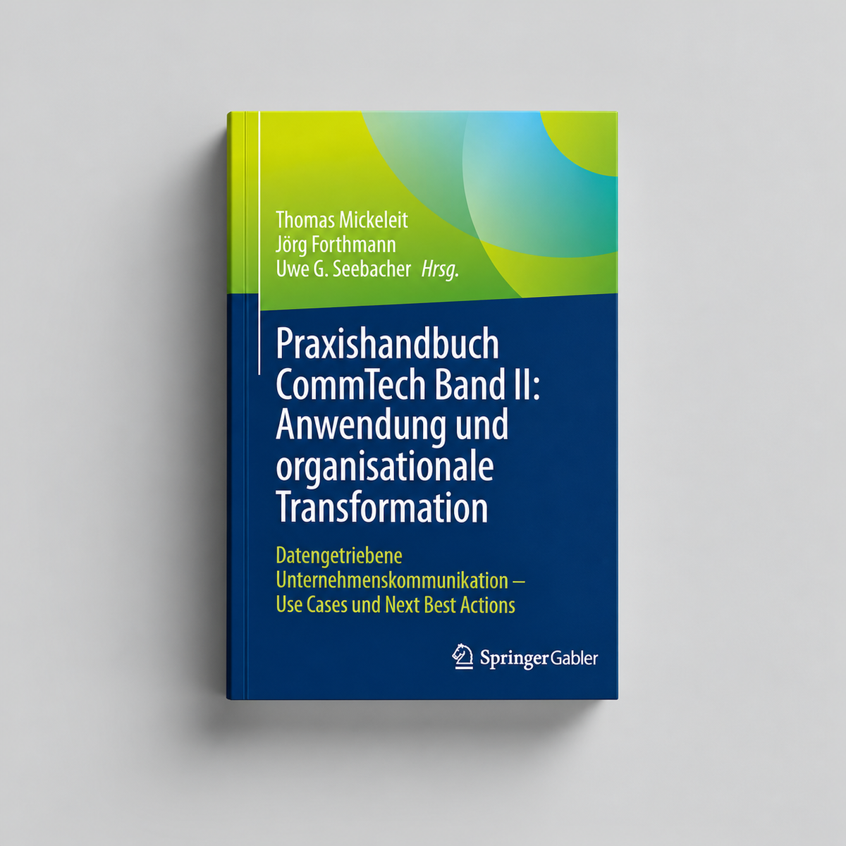 Praxishandbuch CommTech Band II: Anwendung und organisationale Transformation – Buch auf hellgrauem Hintergrund